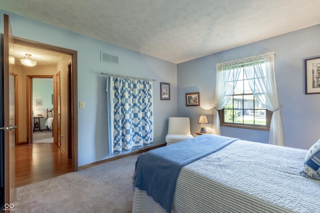 421 Kingsway Ct, Mooresville, IN 46158 - carpeted bedroom featuring a textured ceiling