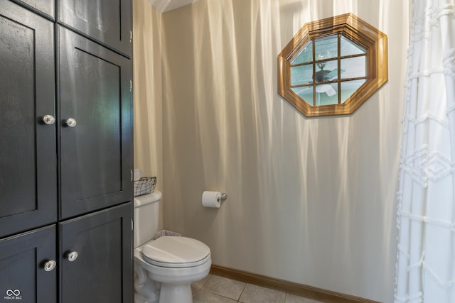 421 Kingsway Ct, Mooresville, IN 46158 - bathroom with tile patterned flooring, toilet, and baseboards