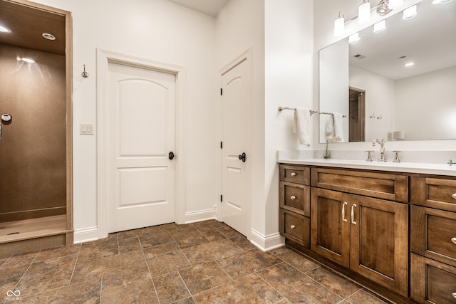13346 W Sherbern Dr, Carmel, IN 46032 - bathroom featuring vanity and stone finish flooring