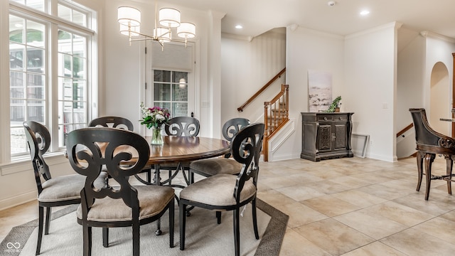 13346 W Sherbern Dr, Carmel, IN 46032 - dining area featuring ornamental molding, healthy amount of natural light, stairs, light tile patterned floors, and a chandelier