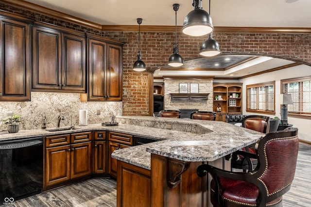 13346 W Sherbern Dr, Carmel, IN 46032 - kitchen with dishwasher, wood finished floors, open floor plan, ornamental molding, and light stone counters