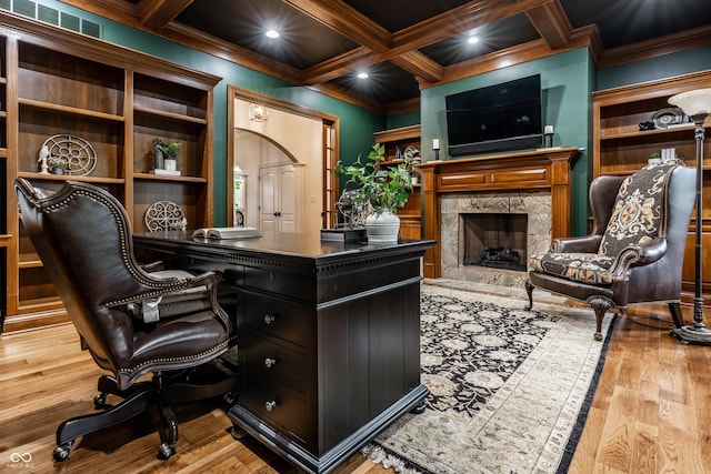13346 W Sherbern Dr, Carmel, IN 46032 - home office featuring beamed ceiling, ornamental molding, wood finished floors, a fireplace, and coffered ceiling