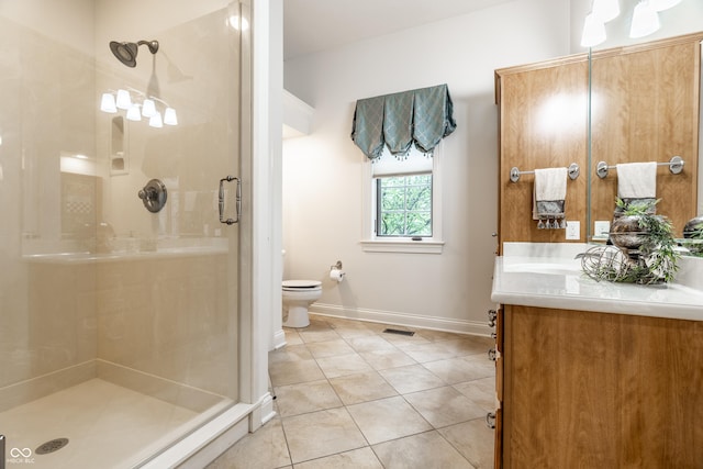 13346 W Sherbern Dr, Carmel, IN 46032 - bathroom with a shower stall, vanity, and tile patterned flooring