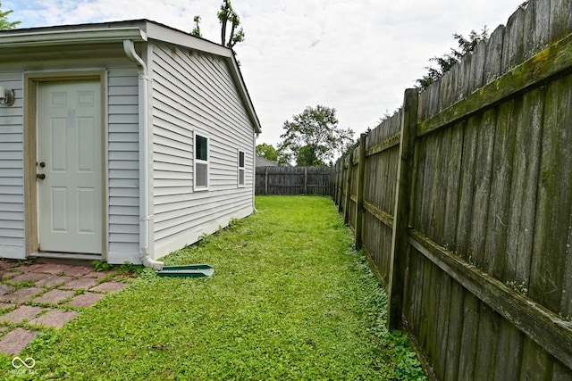 1411 Mimosa Ct, Greenfield, IN 46140 - fenced backyard featuring an outbuilding