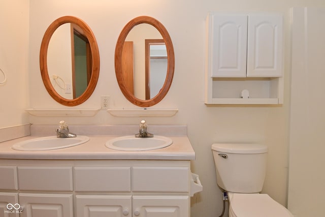 1411 Mimosa Ct, Greenfield, IN 46140 - bathroom featuring double vanity and toilet