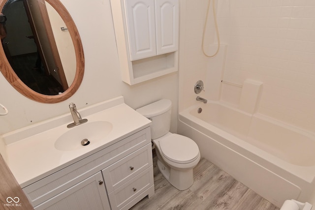 1411 Mimosa Ct, Greenfield, IN 46140 - bathroom with wood finished floors, vanity, and shower / washtub combination