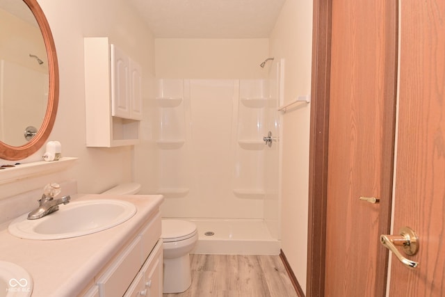 1411 Mimosa Ct, Greenfield, IN 46140 - full bathroom with vanity, wood finished floors, and a shower
