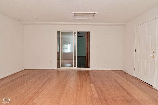 1411 Mimosa Ct, Greenfield, IN 46140 - empty room with attic access and light wood-style flooring