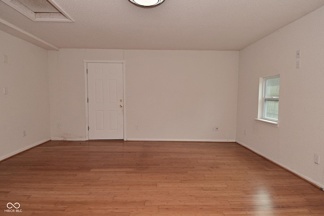1411 Mimosa Ct, Greenfield, IN 46140 - spare room with light wood-style floors and baseboards