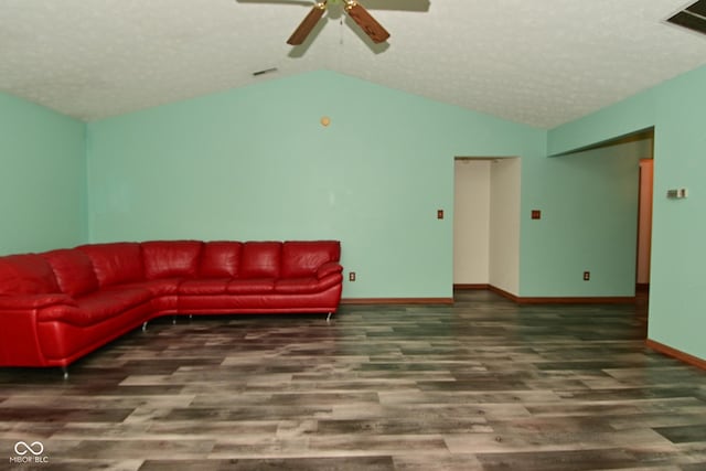 1411 Mimosa Ct, Greenfield, IN 46140 - living room with wood finished floors, a ceiling fan, vaulted ceiling, and a textured ceiling