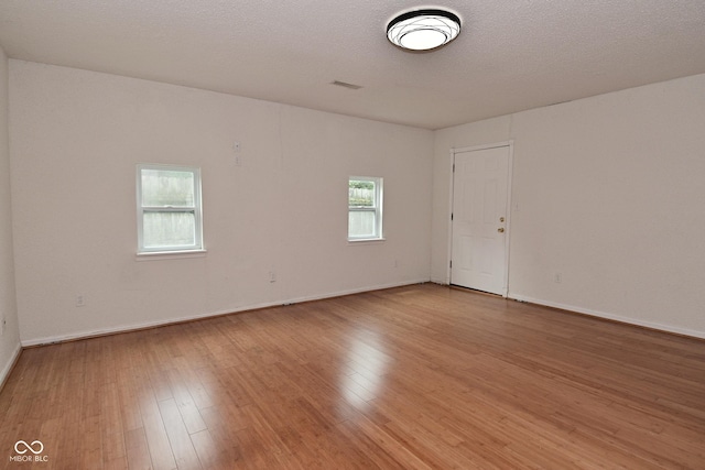 1411 Mimosa Ct, Greenfield, IN 46140 - unfurnished room featuring wood finished floors and baseboards
