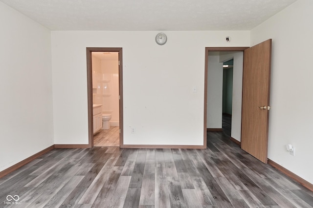 1411 Mimosa Ct, Greenfield, IN 46140 - spare room featuring wood finished floors
