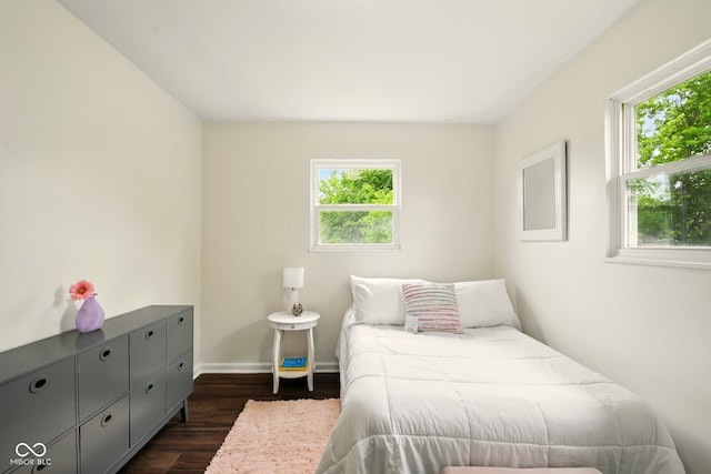 1513 S Rural St, Indianapolis, IN 46203 - bedroom featuring dark wood-style floors and baseboards