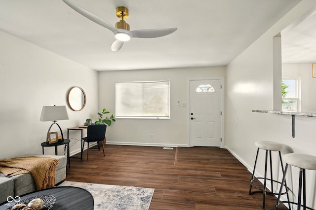 1513 S Rural St, Indianapolis, IN 46203 - entrance foyer with ceiling fan, dark wood-type flooring, and baseboards
