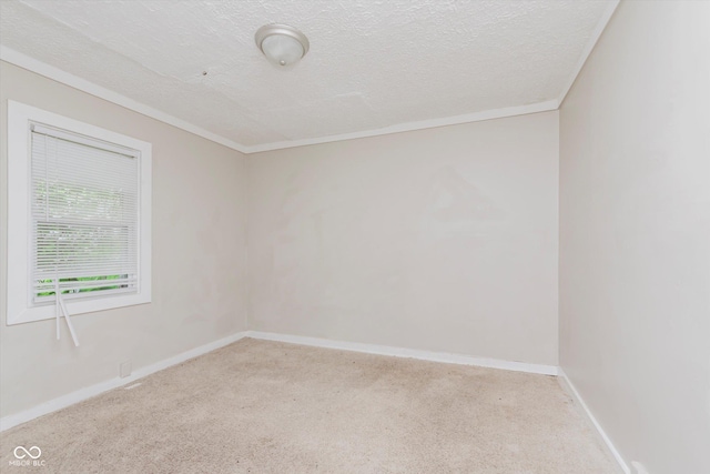 1938 N Dearborn St, Indianapolis, IN 46218 - spare room with carpet floors, a textured ceiling, and ornamental molding