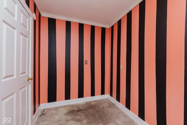 1938 N Dearborn St, Indianapolis, IN 46218 - spare room featuring wallpapered walls, carpet flooring, and a textured ceiling