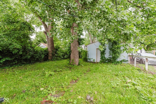 1938 N Dearborn St, Indianapolis, IN 46218 - view of yard with an outbuilding