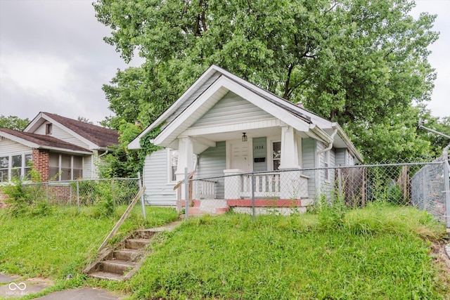 1938 N Dearborn St, Indianapolis, IN 46218 - view of front of house with covered porch