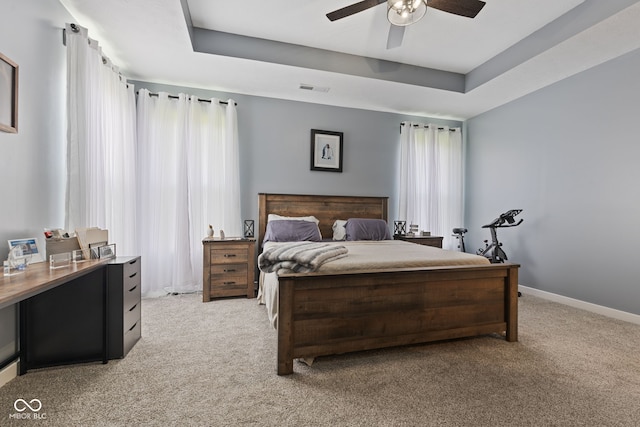 3599 Chalmers Dr, Bargersville, IN 46106 - carpeted bedroom with a raised ceiling, baseboards, and a ceiling fan