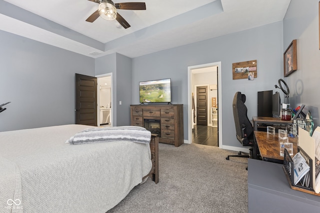3599 Chalmers Dr, Bargersville, IN 46106 - bedroom featuring carpet flooring, an office area, baseboards, connected bathroom, and ceiling fan