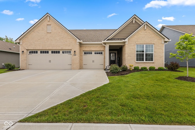 3599 Chalmers Dr, Bargersville, IN 46106 - view of front of property with brick siding, concrete driveway, and a front lawn