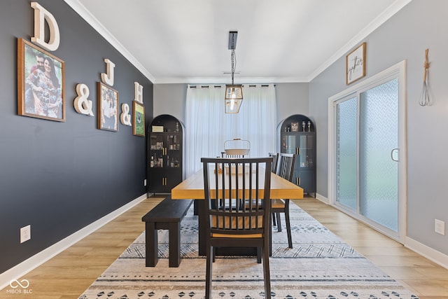 3599 Chalmers Dr, Bargersville, IN 46106 - dining area with healthy amount of natural light, crown molding, and light wood-style floors