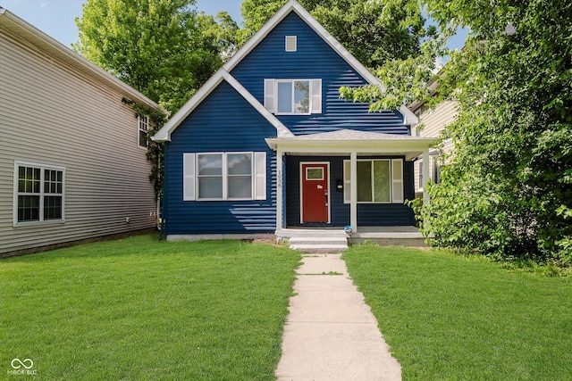 1038 W 33rd St, Indianapolis, IN 46208 - view of front of house with a front yard and covered porch