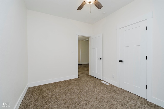 1038 W 33rd St, Indianapolis, IN 46208 - unfurnished bedroom with carpet flooring and ceiling fan
