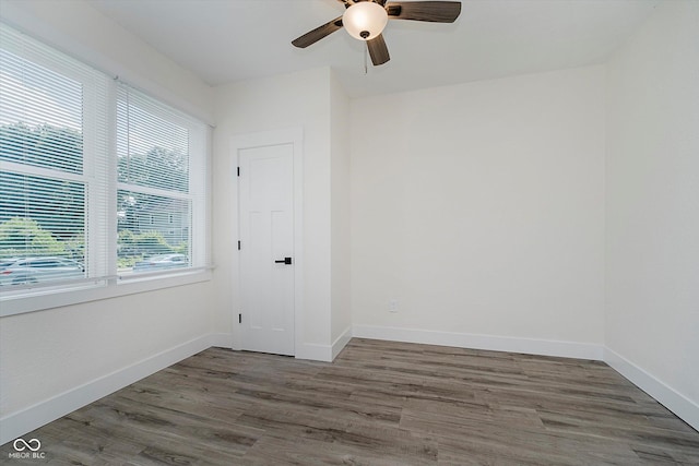 1038 W 33rd St, Indianapolis, IN 46208 - unfurnished room featuring ceiling fan and wood finished floors