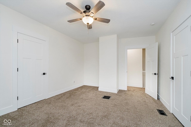 1038 W 33rd St, Indianapolis, IN 46208 - unfurnished bedroom with carpet floors and a ceiling fan