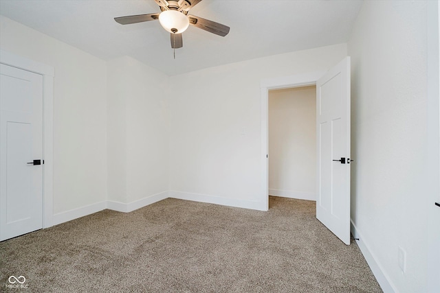 1038 W 33rd St, Indianapolis, IN 46208 - empty room with carpet and a ceiling fan