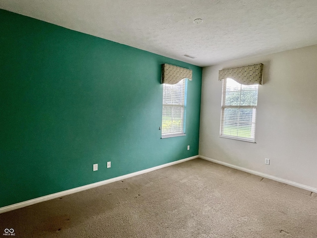 125 Bridgemor Ln, Mooresville, IN 46158 - carpeted empty room with a textured ceiling and baseboards