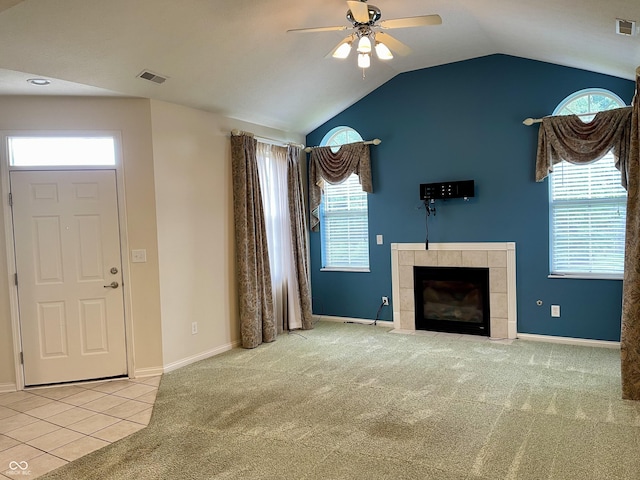 125 Bridgemor Ln, Mooresville, IN 46158 - unfurnished living room featuring ceiling fan, carpet flooring, a fireplace, lofted ceiling, and baseboards