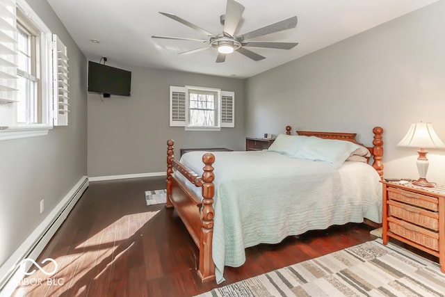 2457 N Centerline Rd, Franklin, IN 46131 - bedroom with a baseboard radiator, wood finished floors, a ceiling fan, and baseboards