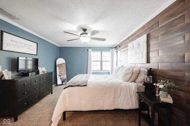 7686 Micawber Ct, Indianapolis, IN 46256 - bedroom featuring carpet floors, crown molding, a textured ceiling, and a ceiling fan