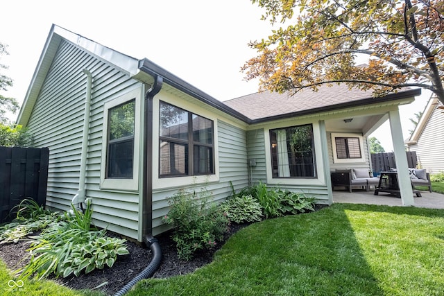 7686 Micawber Ct, Indianapolis, IN 46256 - rear view of house featuring a patio area and outdoor lounge area