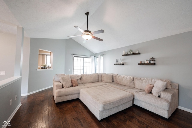 7686 Micawber Ct, Indianapolis, IN 46256 - living area featuring a ceiling fan, lofted ceiling, and dark wood-style flooring