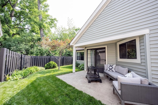 7686 Micawber Ct, Indianapolis, IN 46256 - fenced backyard with outdoor lounge area and a patio