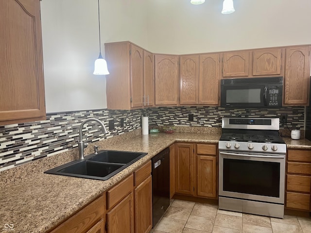 108 Meadowview Dr, Mooresville, IN 46158 - kitchen with black appliances, a sink, tasteful backsplash, pendant lighting, and light countertops