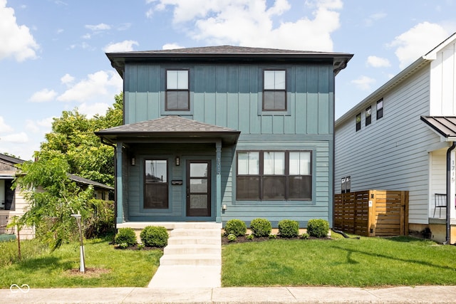 1717 Carrollton Ave, Indianapolis, IN 46202 - view of front facade with board and batten siding
