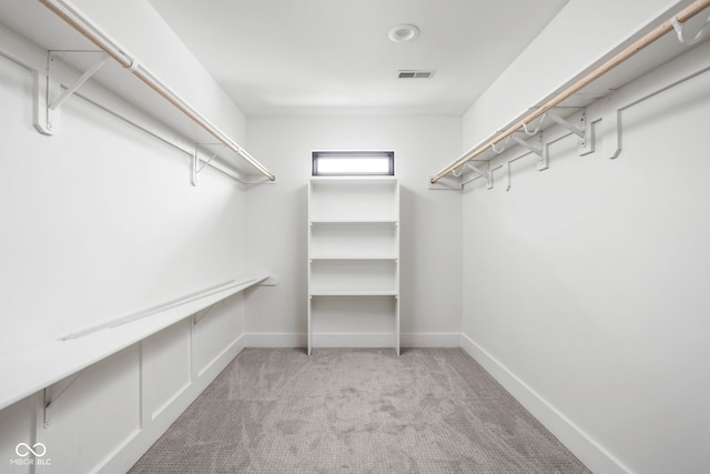 1717 Carrollton Ave, Indianapolis, IN 46202 - walk in closet with carpet flooring