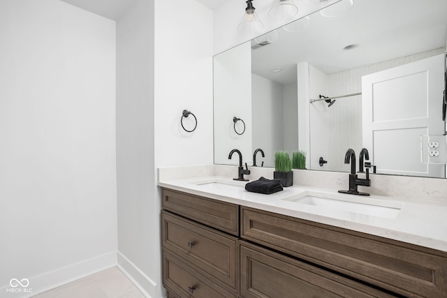 1717 Carrollton Ave, Indianapolis, IN 46202 - bathroom featuring double vanity and a shower