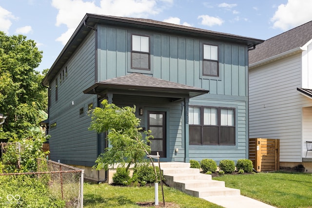 1717 Carrollton Ave, Indianapolis, IN 46202 - view of front facade with board and batten siding