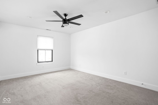 1717 Carrollton Ave, Indianapolis, IN 46202 - carpeted empty room featuring ceiling fan and recessed lighting