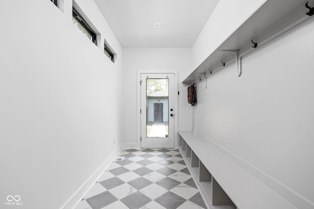 1717 Carrollton Ave, Indianapolis, IN 46202 - mudroom with tile patterned floors and baseboards