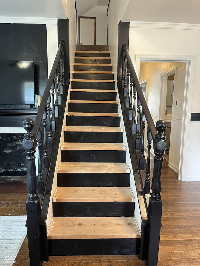 26 Oakwood Ave, North Vernon, IN 47265 - stairs with wood finished floors and crown molding