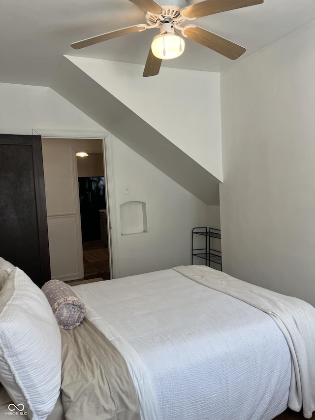 26 Oakwood Ave, North Vernon, IN 47265 - bedroom with lofted ceiling and a ceiling fan
