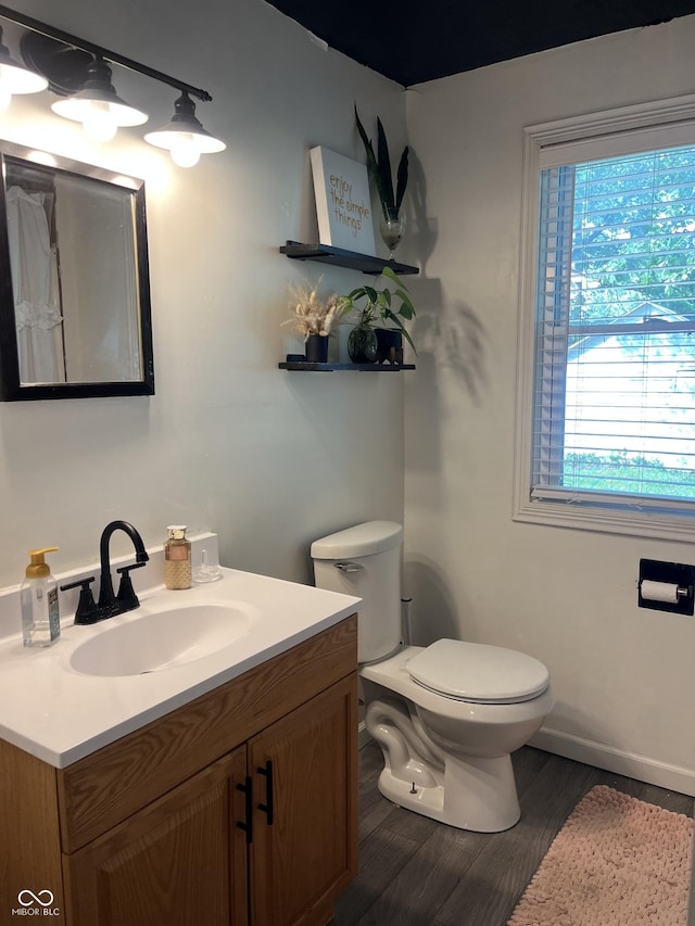 26 Oakwood Ave, North Vernon, IN 47265 - full bath with vanity, toilet, wood finished floors, and curtained shower