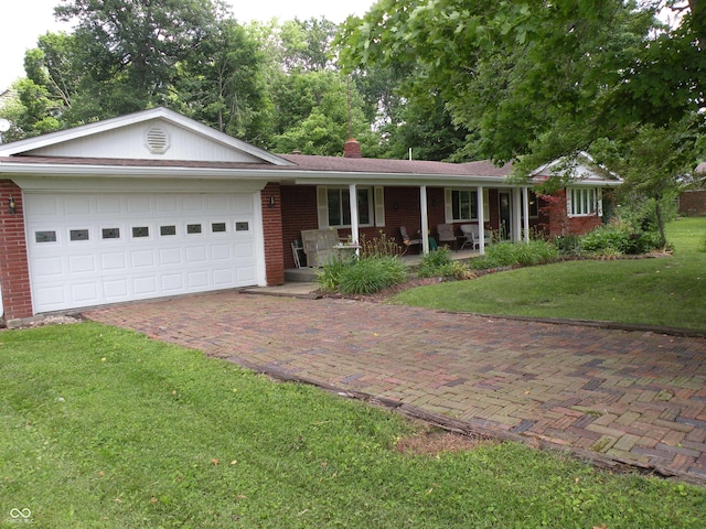 1796 N 400 W, Crawfordsville, IN 47933 - ranch-style home featuring covered porch, brick siding, decorative driveway, a chimney, and an attached garage