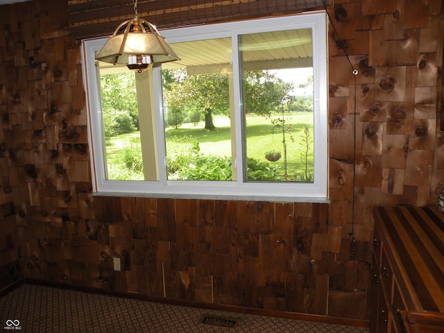 1796 N 400 W, Crawfordsville, IN 47933 - unfurnished dining area with healthy amount of natural light and wood walls